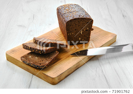 Top view of loaf of brown sourdough bread 71901762
