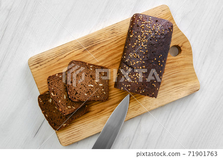 Top view of loaf of brown sourdough bread Top view of loaf of brown sourdough bread 71901763