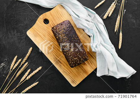 Top view of loaf of brown sourdough bread 71901764