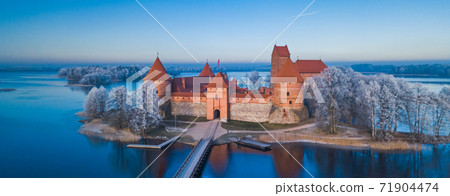 Trakai castle at winter, aerial view above the castle Trakai castle at winter, aerial view above the castle 71904474