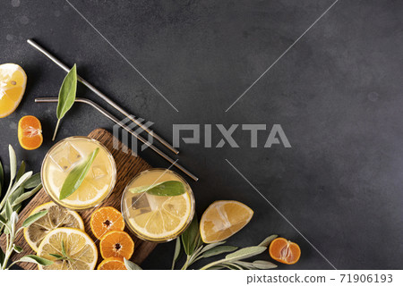 homemade lemonade with lemon slices and ice in glasses homemade lemonade with lemon slices and ice in glasses 71906193