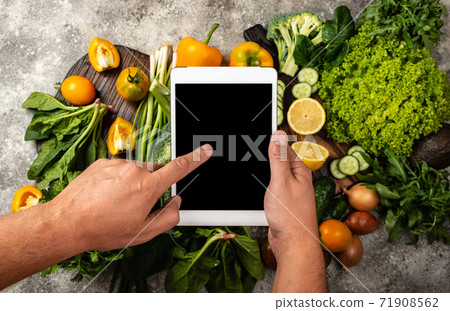 Order Delivery food online concept. Male hands - Stock Photo [71908562]  - PIXTA