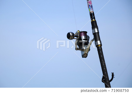 PORT DICKSON, MALAYSIA -APRIL 28, 2017: Fishing rods complete with the motor used by fisherman. These rods are used to fish in coastal fishing. PORT DICKSON, MALAYSIA -APRIL 28, 2017: Fishing rods complete with the motor used by fisherman. These rods are used to fish in coastal fishing. 71908750