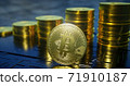 3d render of metallic bitcoin with rising columns of coins in background. 71910187