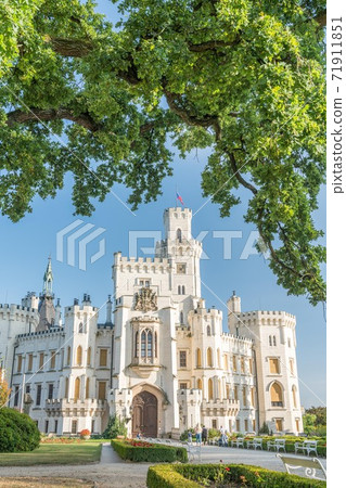 Beautiful renaissance castle Hluboka in the Czech Republic is located in south bohemia. Summer weather with blue sky and rose gardens. UNESCO heritage. Beautiful renaissance castle Hluboka in the Czech Republic is located in south bohemia. Summer weather with blue sky and rose gardens. UNESCO heritage. 71911851