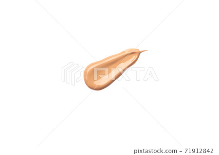 Bright beige smear of foundation diagonal strokes isolated on a white background. 71912842