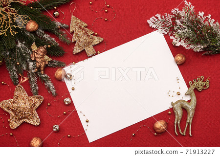 sheet for the inscription or for christmas on a red fabric background sheet for the inscription or for christmas on a red fabric background 71913227