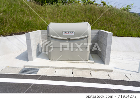 Garbage storage box in a residential area Garbage storage box in a residential area 71914272