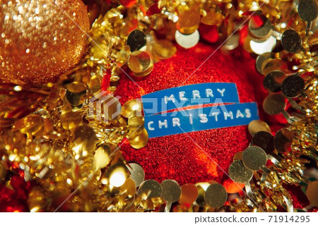 Christmas decorations mixed in storage box 71914295