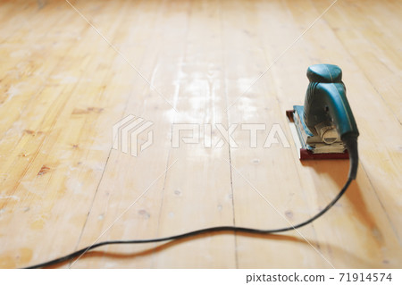 wooden floor sanding with flat sander tool 71914574