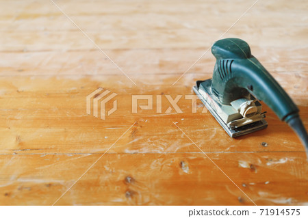 wooden floor sanding with flat sander tool 71914575