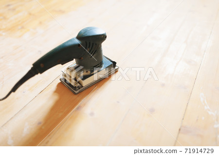 wooden floor sanding with flat sander tool 71914729