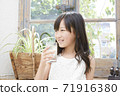 Girls drink water 71916380