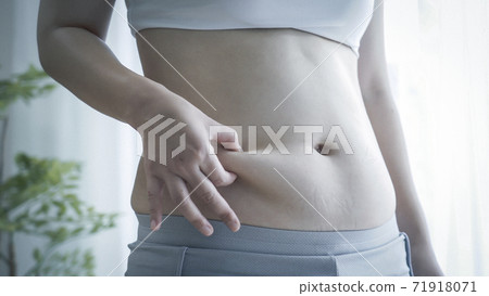 Woman picking belly meat Woman picking belly meat 71918071