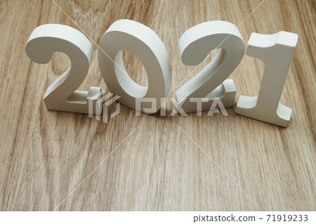 2021 Happy New Year with space copy on wooden background 2021 Happy New Year with space copy on wooden background 71919233