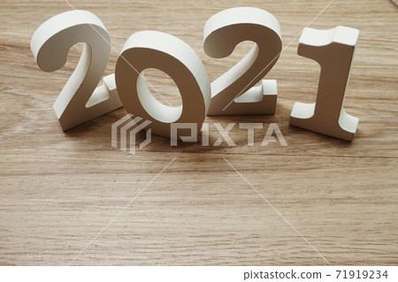 2021 Happy New Year with space copy on wooden background 2021 Happy New Year with space copy on wooden background 71919234