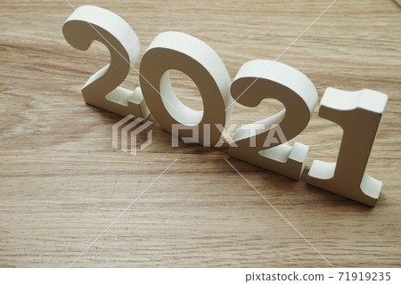 2021 Happy New Year with space copy on wooden background 2021 Happy New Year with space copy on wooden background 71919235