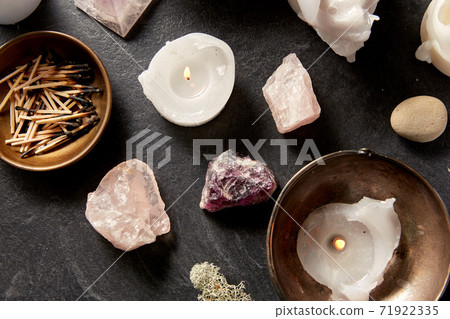 burning candles and crystals for magic ritual 71922335