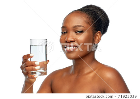 young african american woman with glass of water 71923039