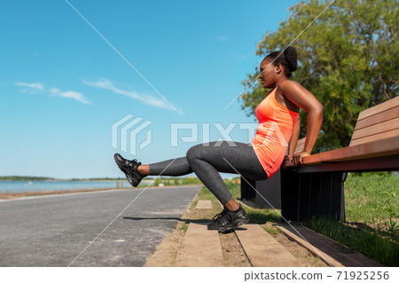 african american woman doing sports at seaside african american woman doing sports at seaside 71925256