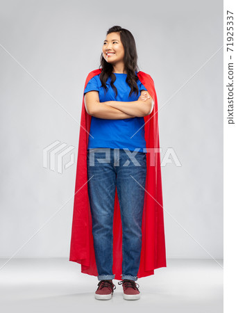 happy asian woman in red superhero cape happy asian woman in red superhero cape 71925337