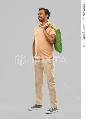 man with reusable canvas bag for food shopping man with reusable canvas bag for food shopping 71925888