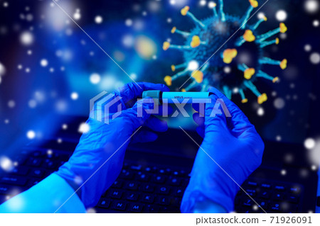 hand holding beaker with coronavirus blood test hand holding beaker with coronavirus blood test 71926091