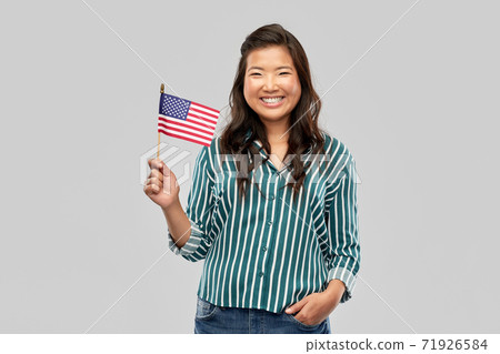 happy asian woman with flag of america 71926584