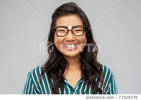 portrait of happy asian woman in glasses portrait of happy asian woman in glasses 71928370