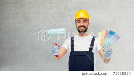 male builder with paint roller and color palettes male builder with paint roller and color palettes 71928834