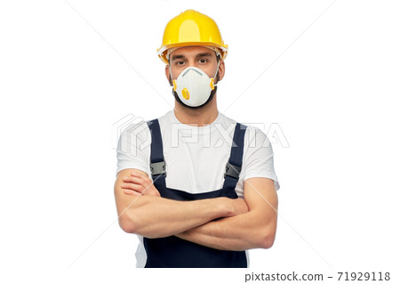 male worker or builder in helmet and respirator 71929118