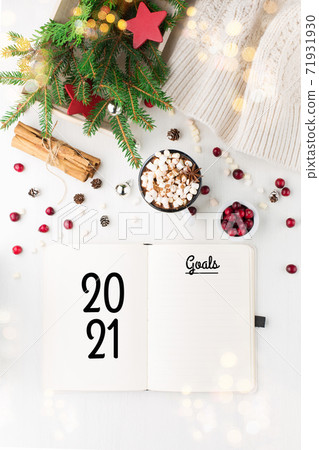 New Year Resolution Goal List 2021. Top view, copy space. New Year Resolution Goal List 2021. Top view, copy space. 71931930