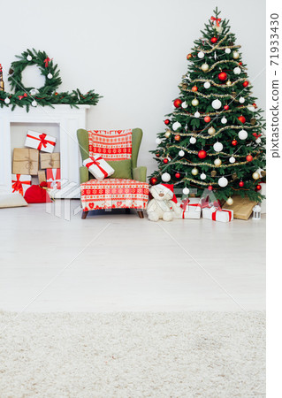 White room Christmas tree pine with gifts new year interior decor White room Christmas tree pine with gifts new year interior decor 71933430