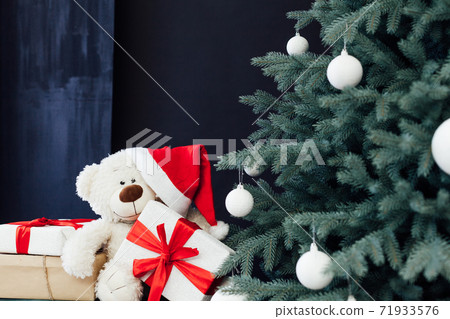 Christmas tree pine with gifts new year interior decor background Christmas tree pine with gifts new year interior decor background 71933576