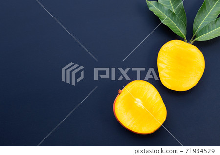 Tropical fruit, Mango  on dark background. 71934529