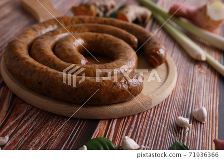 Local Northern Thai food , Northern Thai spicy sausage street food isolated in white background Local Northern Thai food , Northern Thai spicy sausage street food isolated in white background 71936366