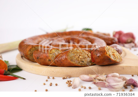 Local Northern Thai food , Northern Thai spicy sausage street food isolated in white background Local Northern Thai food , Northern Thai spicy sausage street food isolated in white background 71936384