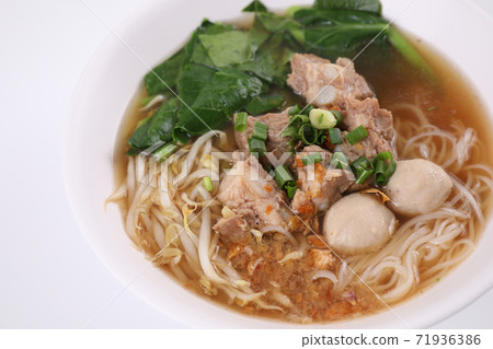 Local Thai food , Noodle with meat ball and pork isolated in white background Local Thai food , Noodle with meat ball and pork isolated in white background 71936386