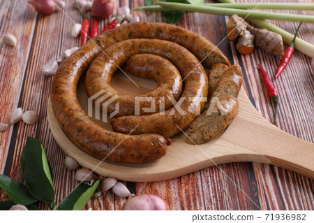 Local Northern Thai food , Northern Thai spicy sausage street food isolated in white background 71936982