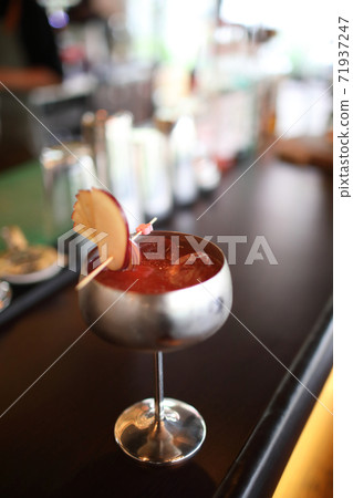 cocktails in glasses on bar counter in pup or restaurant 71937247