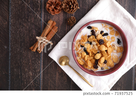 Cereal dessert with corn oat and dry fruits isolated in wood background 71937525