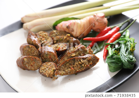 Local Northern Thai food , Northern Thai spicy sausage street food isolated in white background Local Northern Thai food , Northern Thai spicy sausage street food isolated in white background 71938435