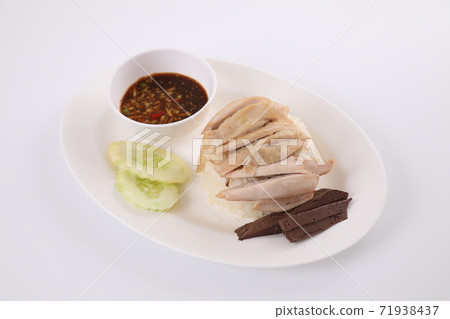Thai food gourmet steamed chicken with rice , khao mun kai in wood background Thai food gourmet steamed chicken with rice , khao mun kai in wood background 71938437