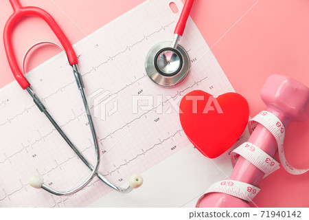 stethoscope and heart on a cardio diagram. stethoscope and heart on a cardio diagram. 71940142