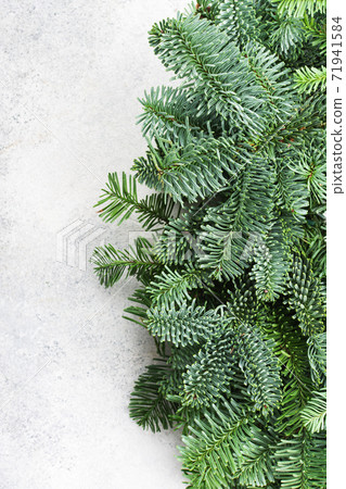 Christmas background made of fir tree brunches Christmas background made of fir tree brunches 71941584