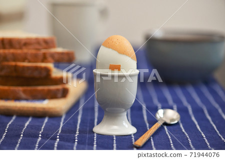 Boiled egg lookalike Hitler hair and moustache 71944076
