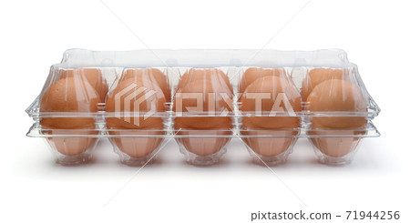 Chicken eggs on plastic container isolated. Chicken eggs on plastic container isolated. 71944256