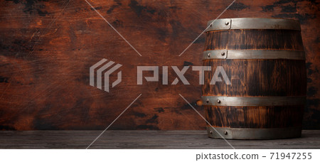Old wooden barrel for wine or whiskey aging Old wooden barrel for wine or whiskey aging 71947255