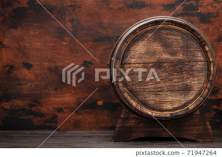 Old wooden barrel for wine or whiskey aging Old wooden barrel for wine or whiskey aging 71947264