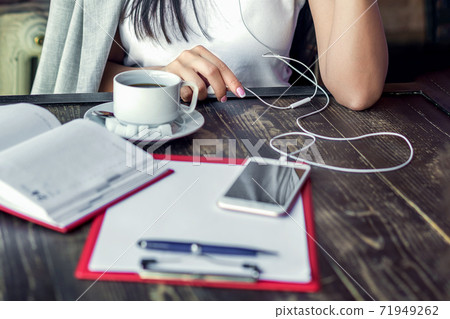 Woman listening to music. Woman listening to music. 71949262